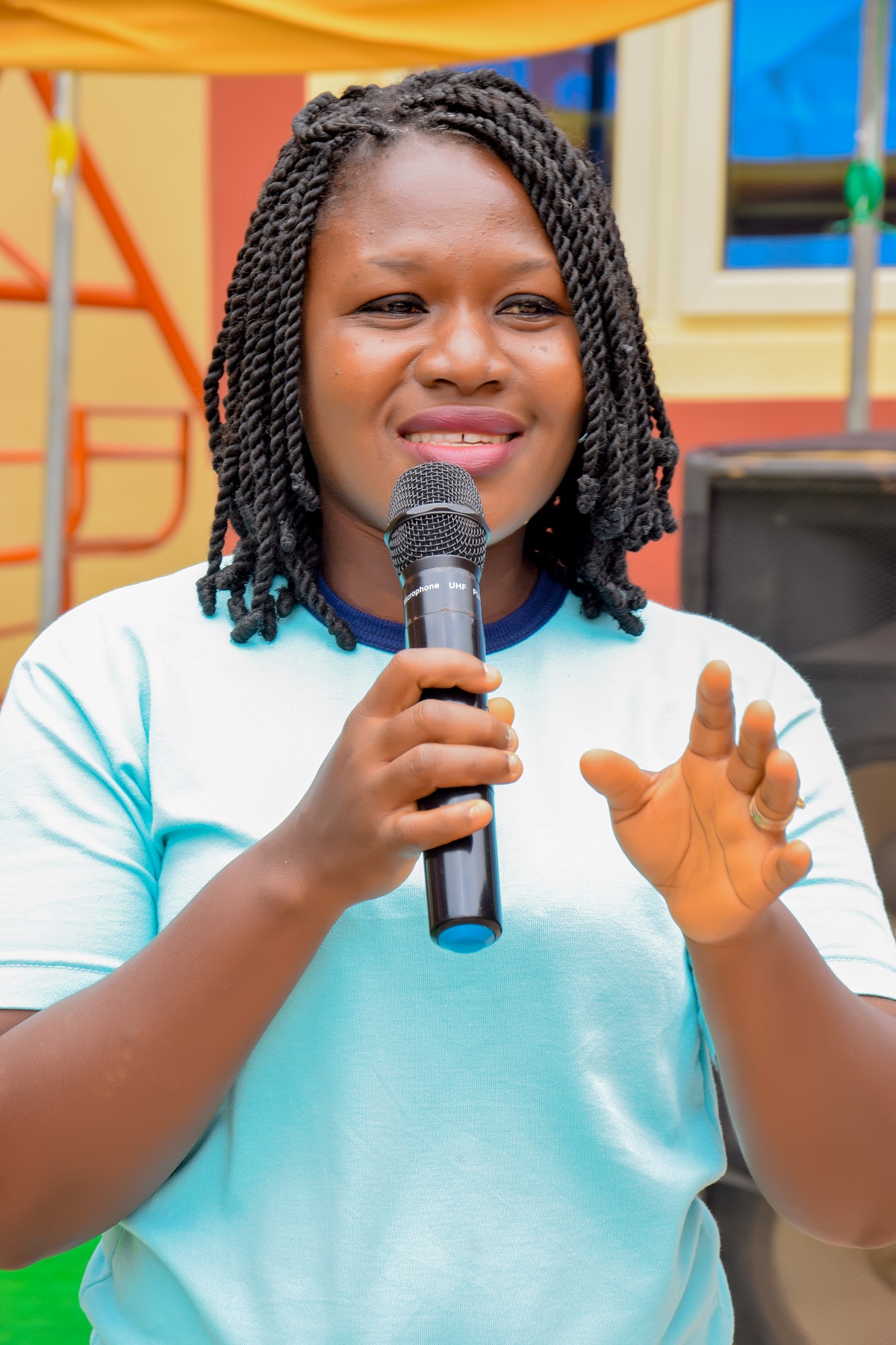 Mrs. Ifedapo giving testimony about the school.