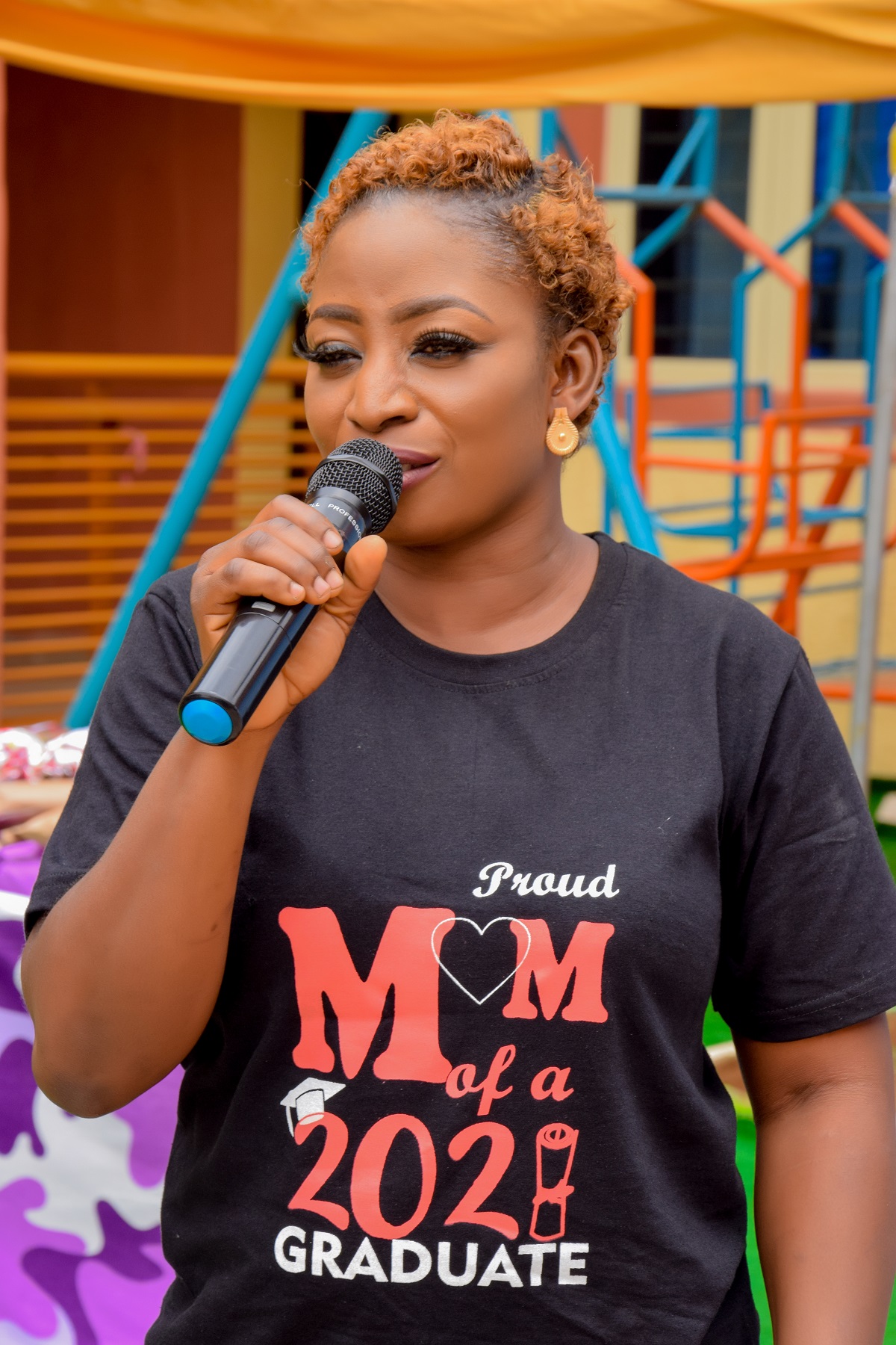 Graduand's mother, Mrs. Hassan giving testimony about the school.